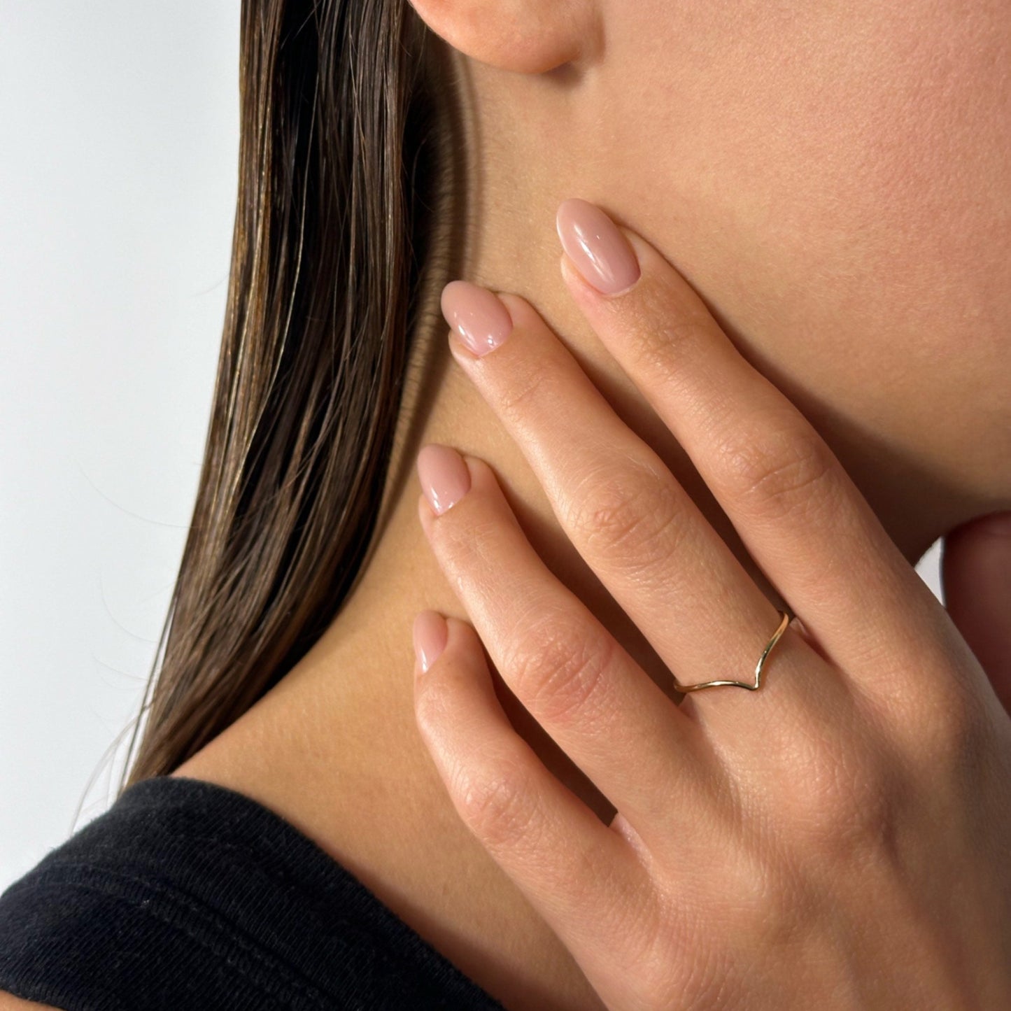 lady wearing gold chevron ring