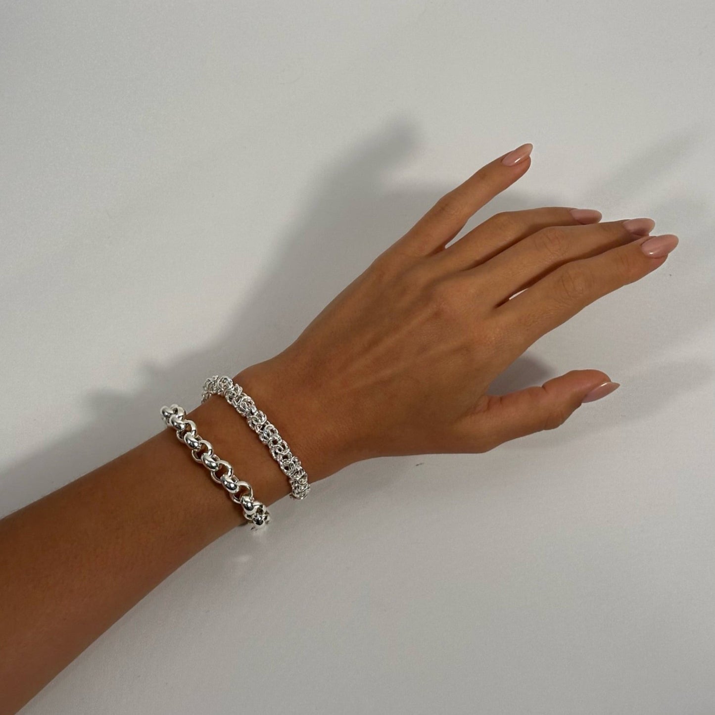 woman wearing sterling silver bold statement rolo chain byzantine bracelet