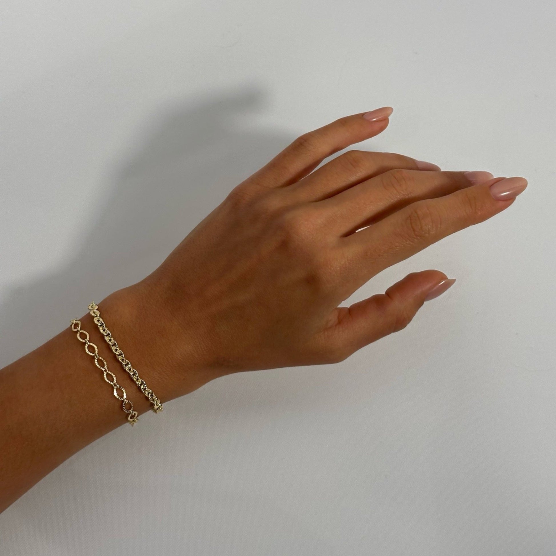 woman wearing 14k gold filled vintage classic textured chain timeless statement bracelet