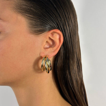 woman wearing 14k gold triple bar classic statement timeless earrings