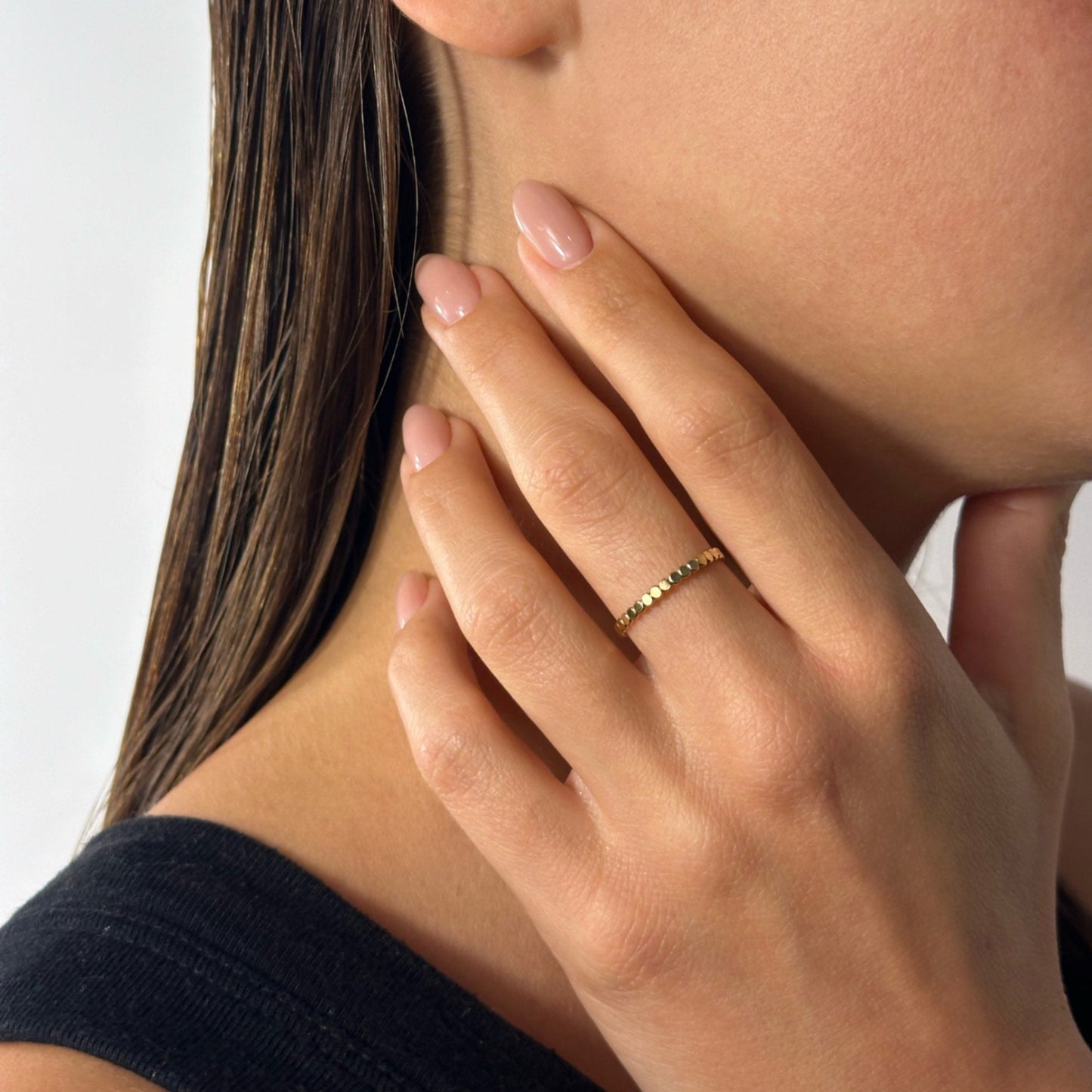 lady wearing gold filled beaded ring