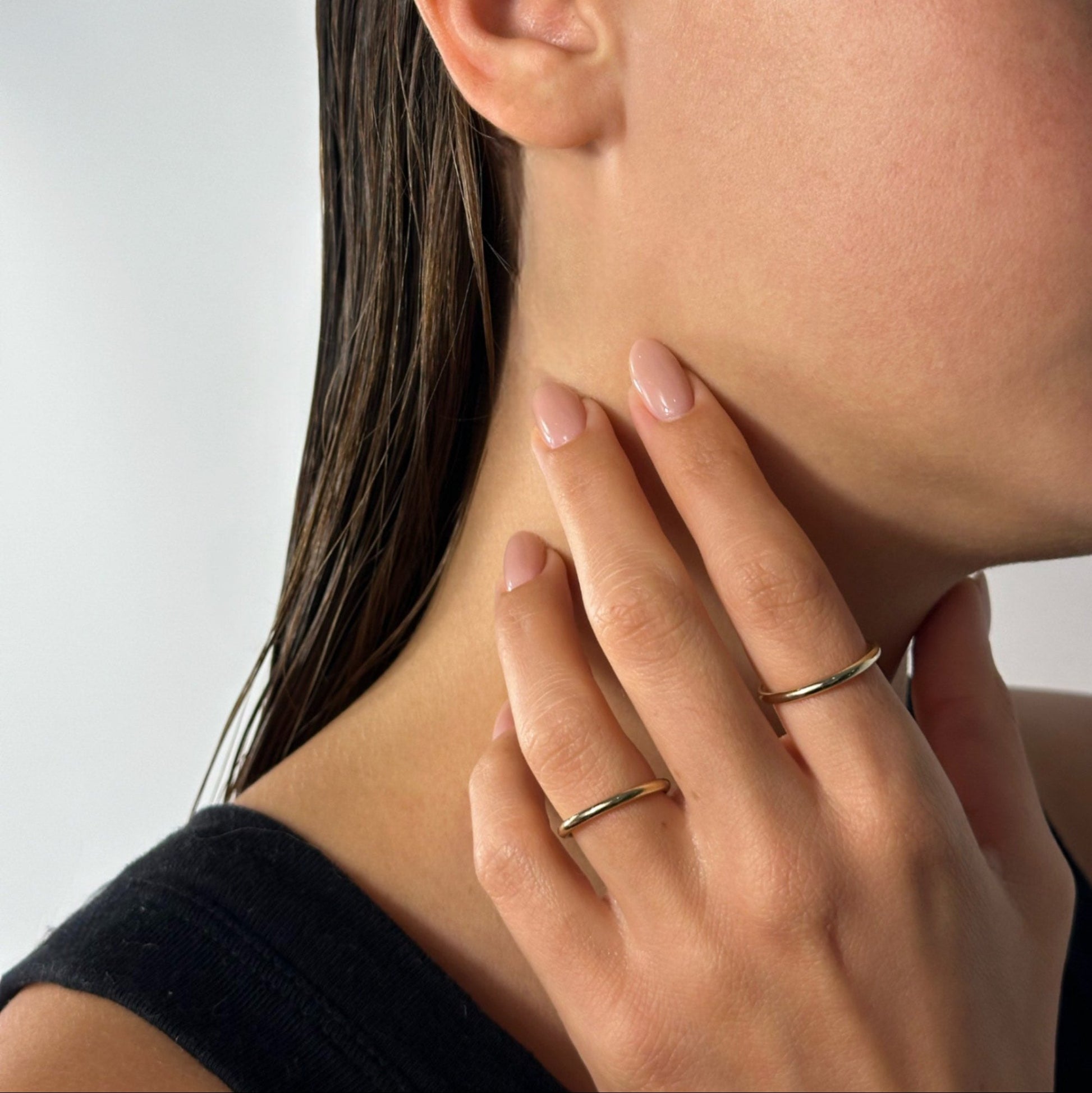 lady wearing gold filled plain band ring