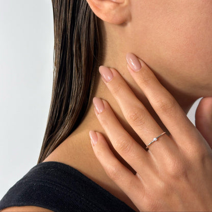 lady wearing silver cubic zirconia stone ring