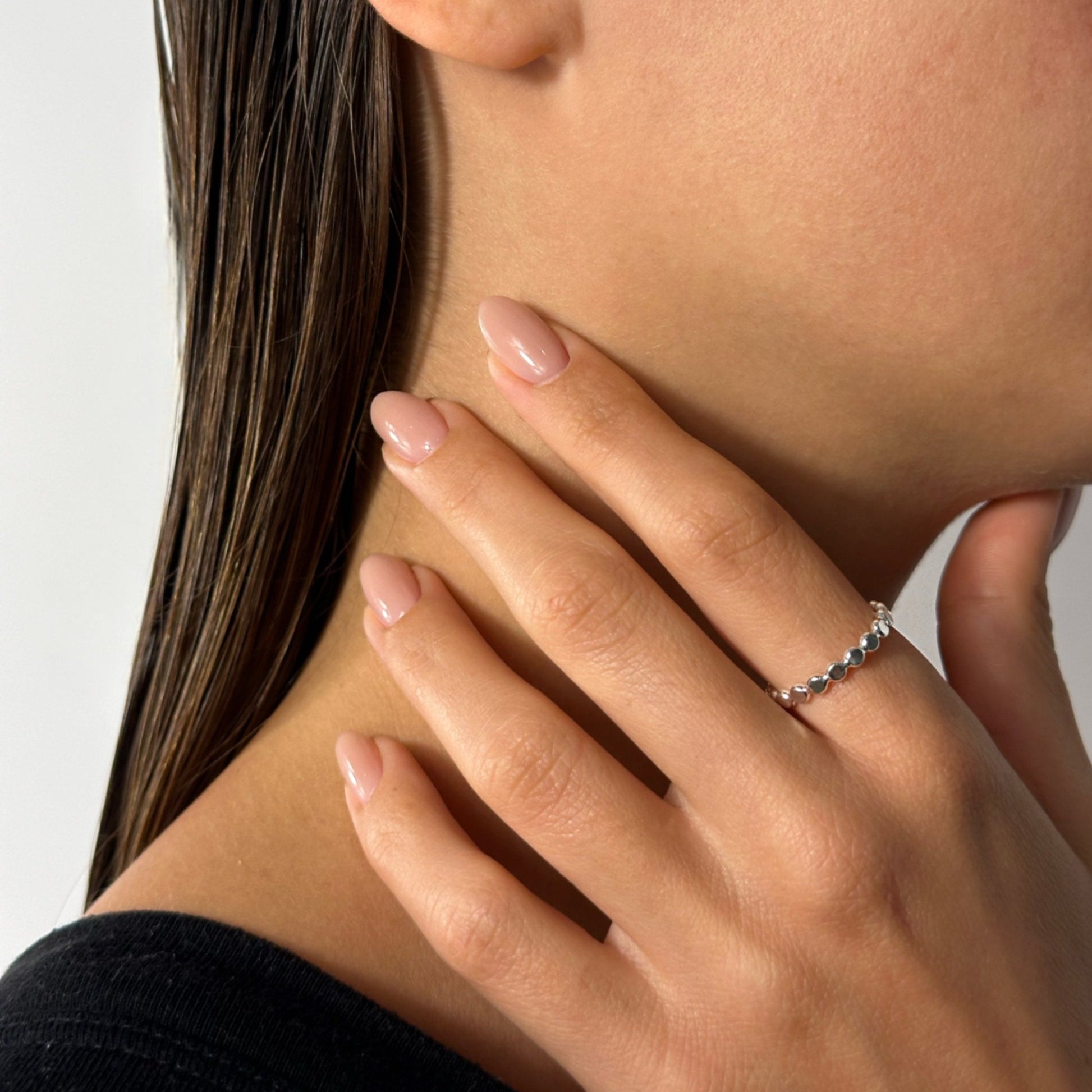 lady wearing sterling silver beaded ring