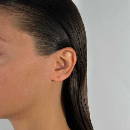 lady wearing sterling silver studs 