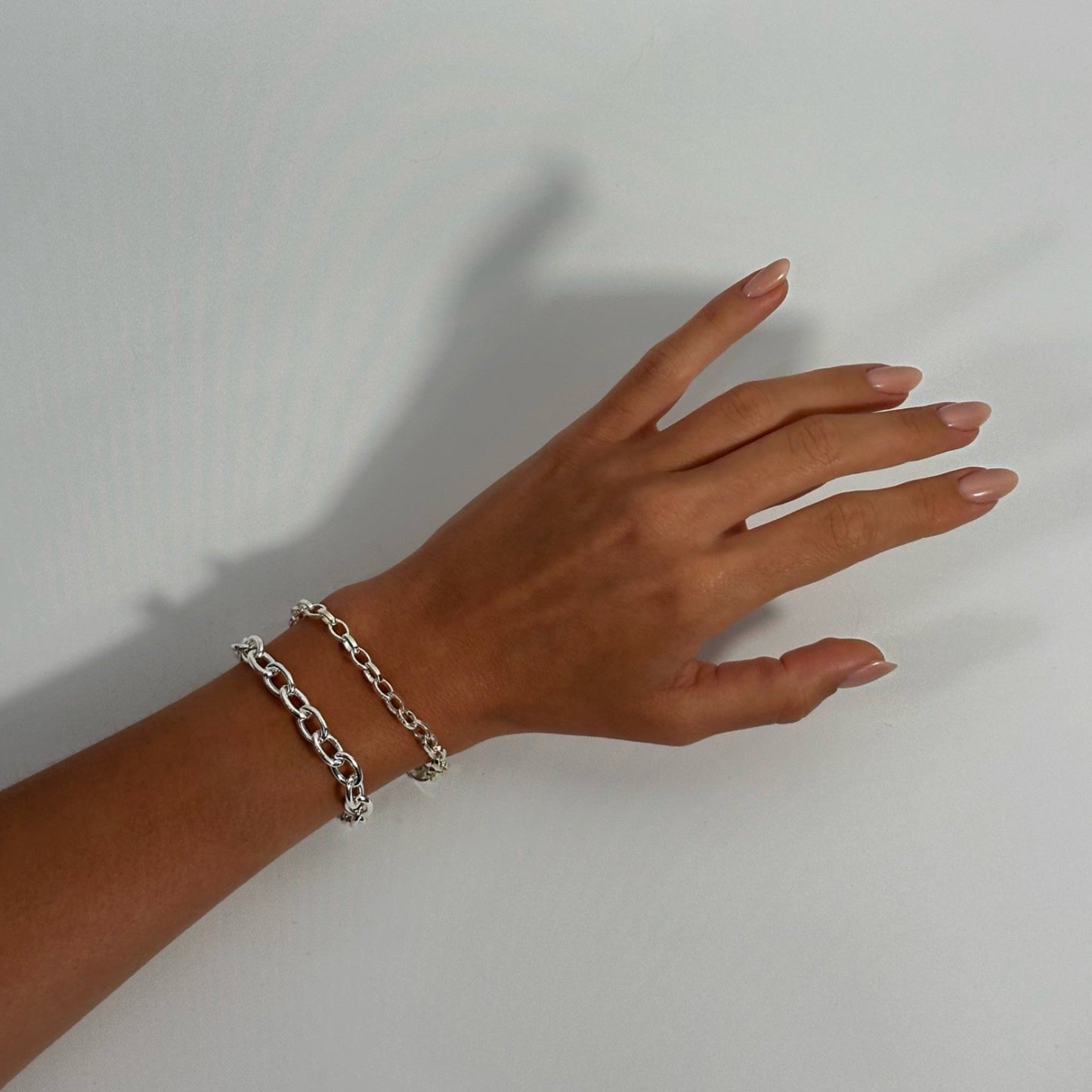 woman wearing sterling silver timeless classic oval chain bracelet